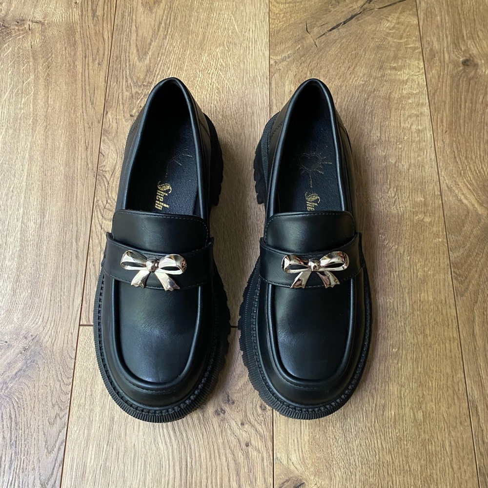 Bow loafers.